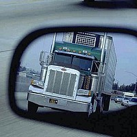 Graphic Image - Truck in Rear View Mirror