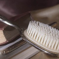 Graphic Image - Hair Brush with Hair for DNA Testing